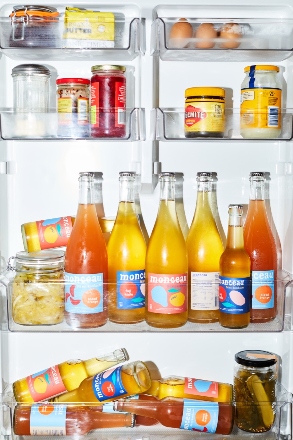 A home fridge stocked with bottles of Monceau